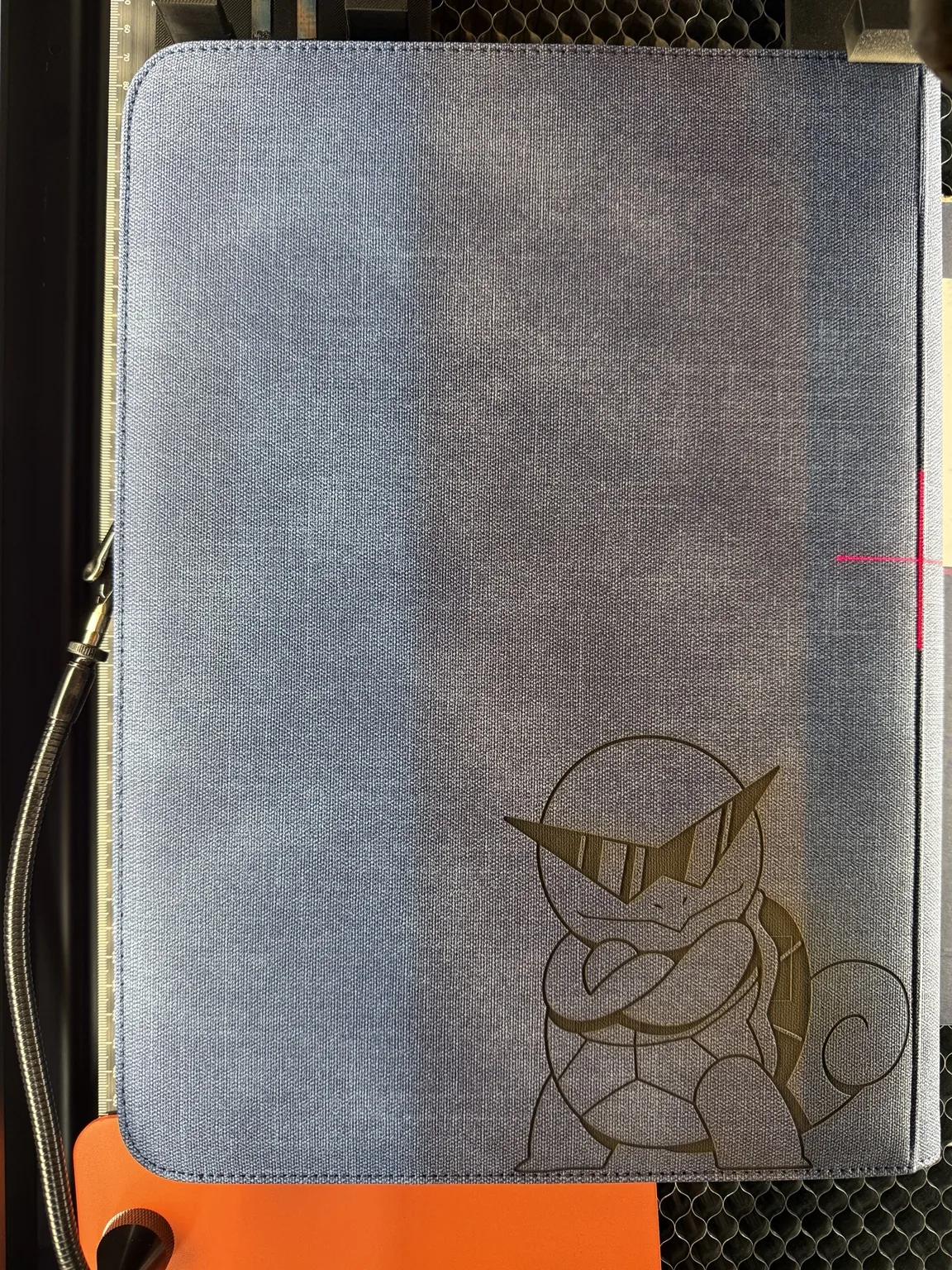 Custom laser engraved binder artwork