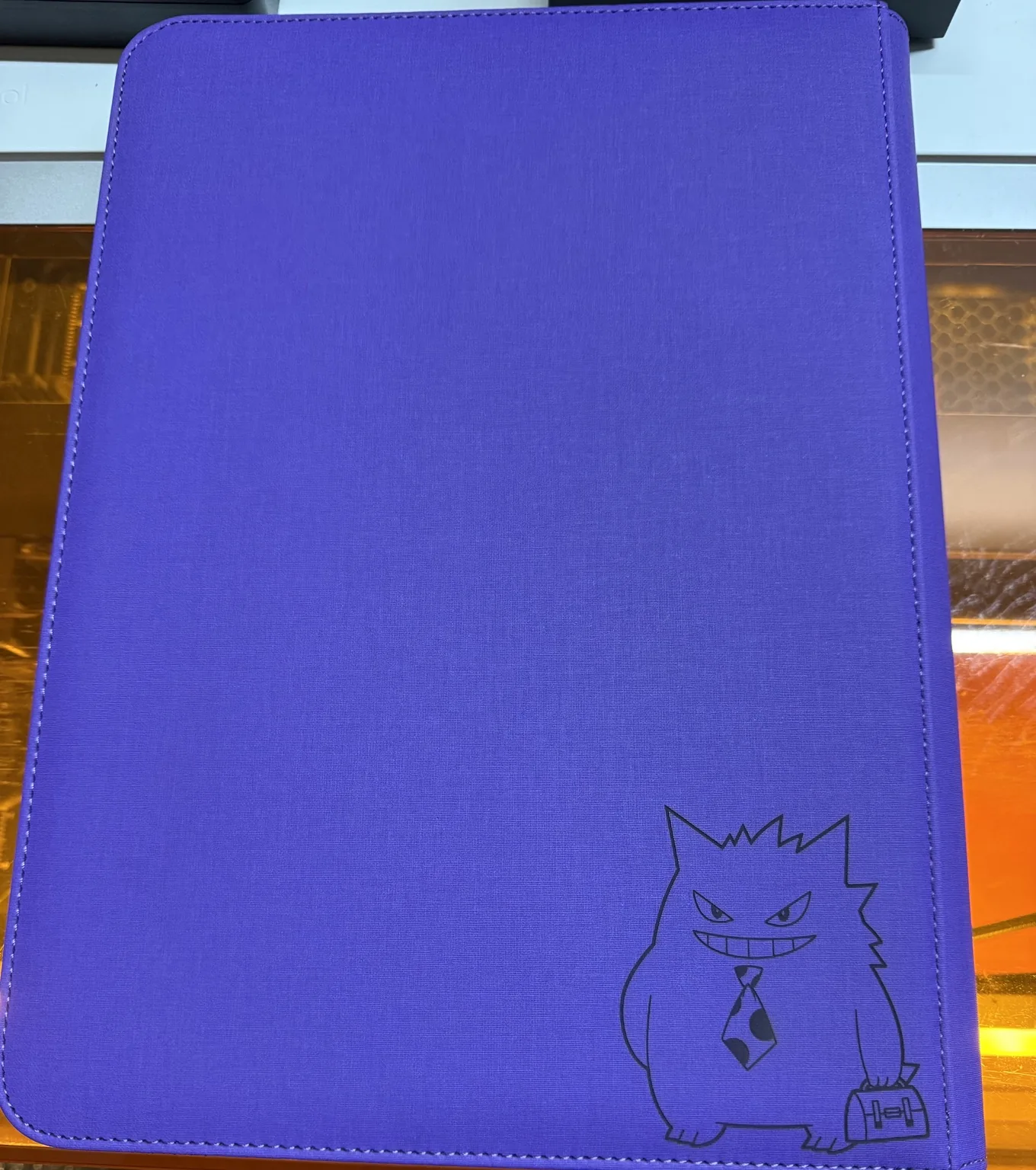 Custom laser engraved binder artwork