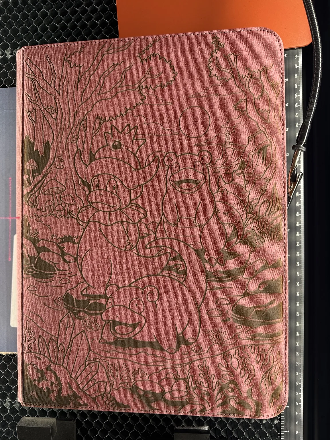 Custom laser engraved binder artwork