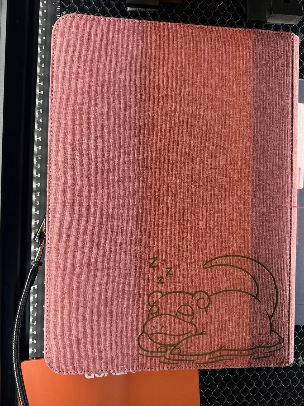 Custom laser engraved binder artwork